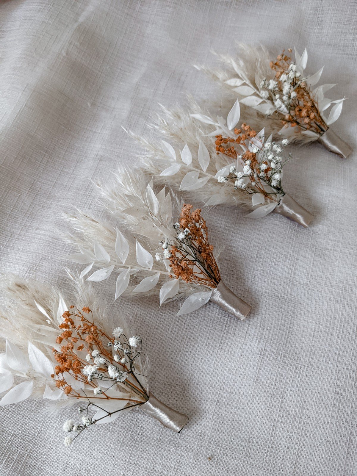 Pampas & orange gypsophila buttonhole